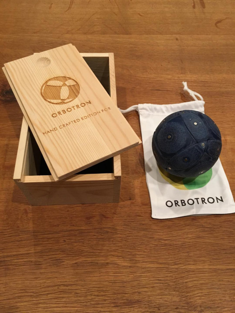 Orbotron with laser etched wood box and printed sack.