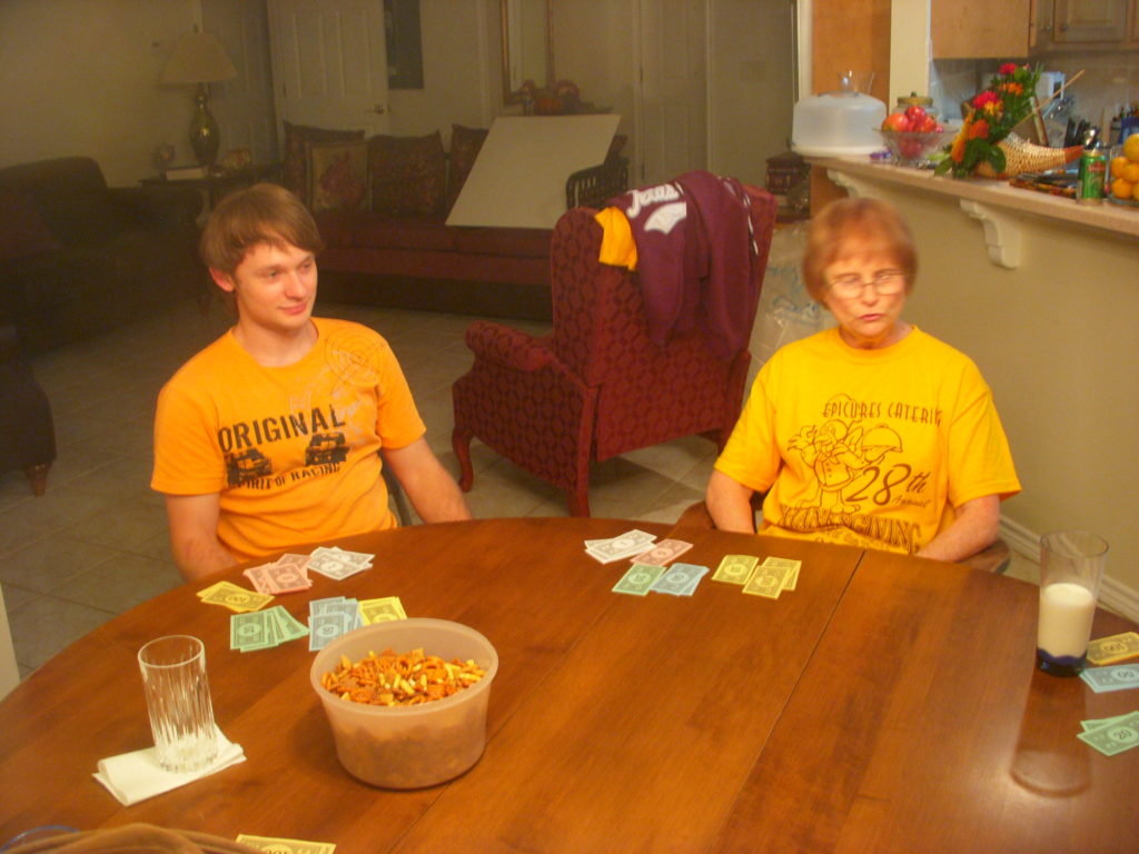 Mike playing Texas Hold-Em with my mother, using Monopoly money.