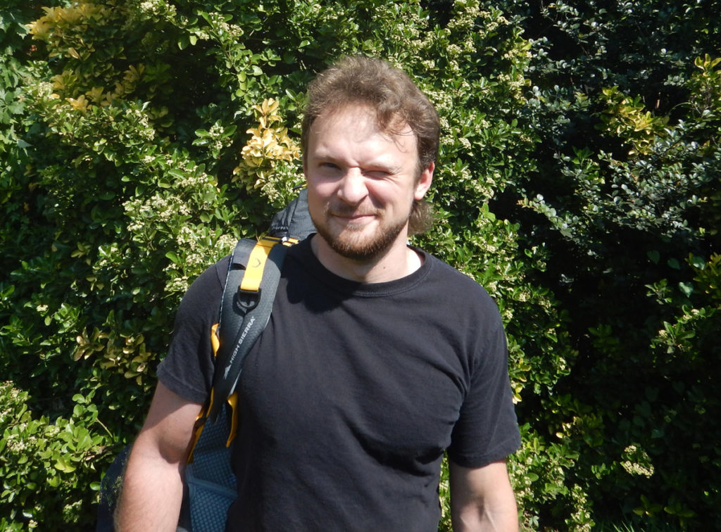 Mike, squinting in the Texas heat and sunlight, just before leaving the United States for the last time. Early summer, 2016.